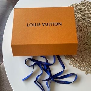 Louis Vuitton box and ribbon